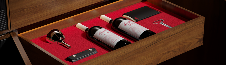 Open drawer reveals two Grange magnums with white capsules