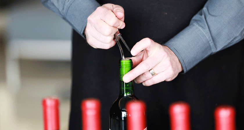 Cork being removed from a Penfolds bottle