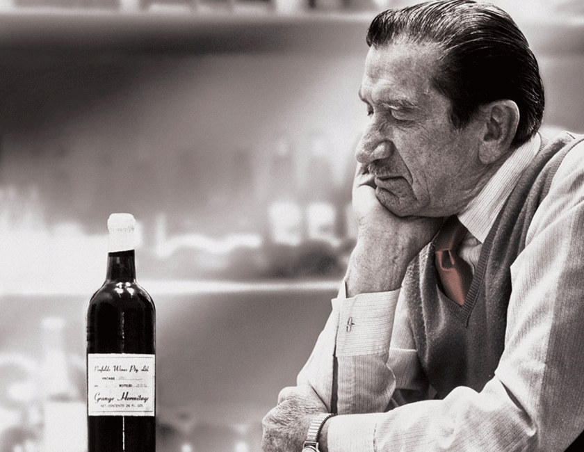 Max Schubert with a bottle of Grange